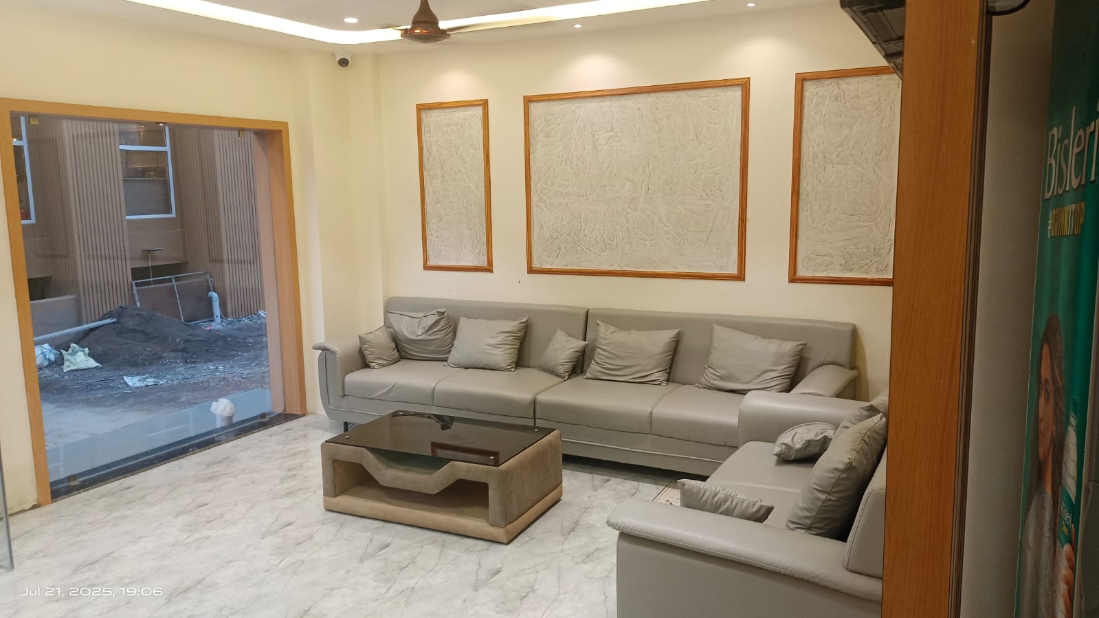 Guest sitting areawith comfortable sofas at Hotel Krishnay Somnath